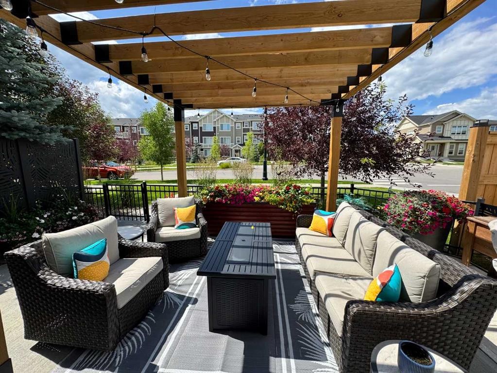 216 Sundown Road, Cochrane, AB - Outdoor With Deck Patio Veranda With Exterior