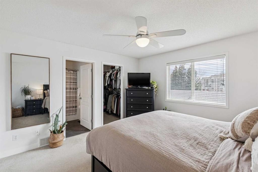 94 West Springs Way Sw, Calgary, AB - Indoor Photo Showing Bedroom