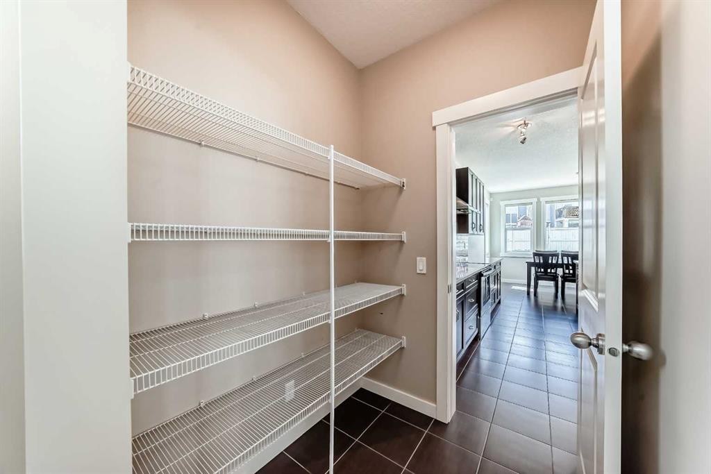 210 Stonemere Green, Chestermere, AB - Indoor With Storage