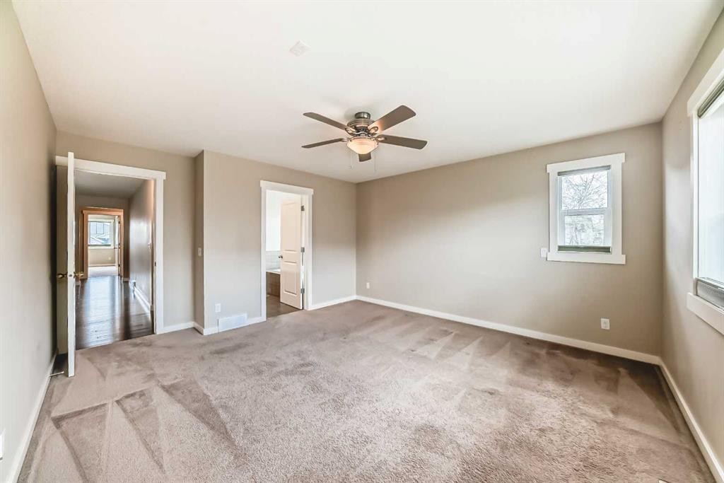 210 Stonemere Green, Chestermere, AB - Indoor Photo Showing Other Room