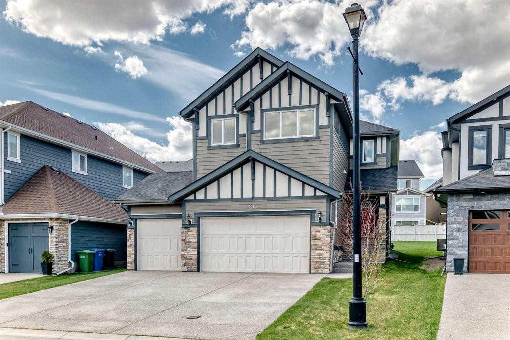 210 Stonemere Green, Chestermere, AB - Outdoor With Facade