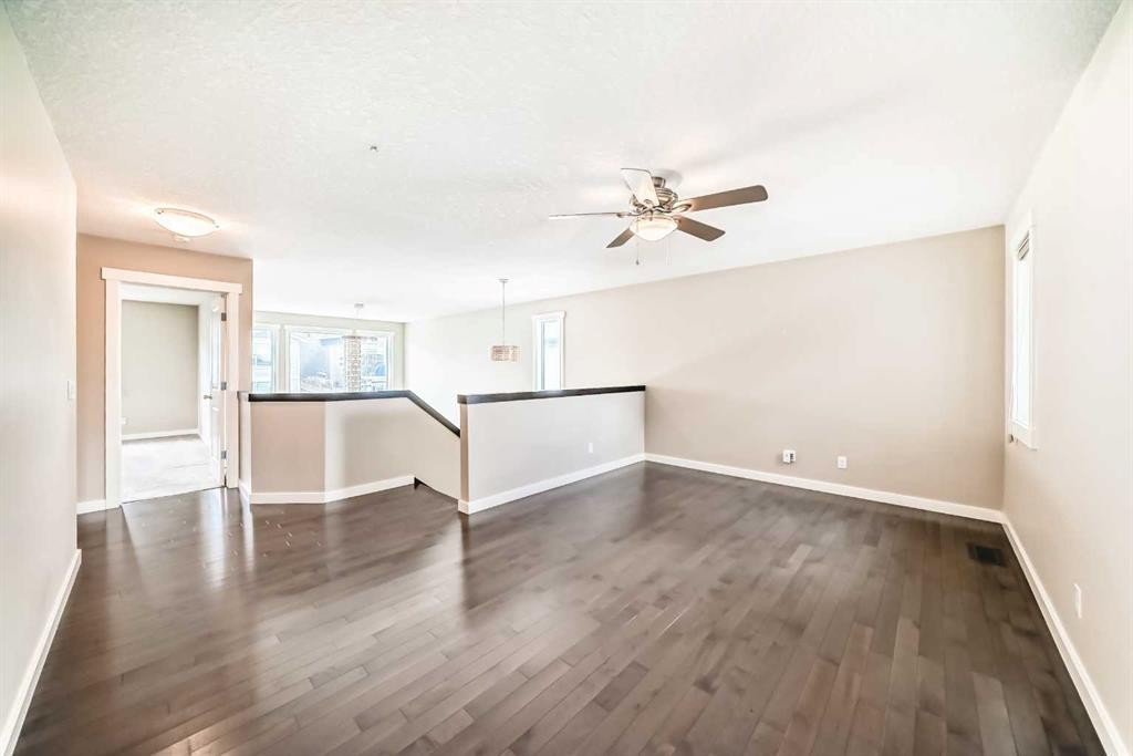 210 Stonemere Green, Chestermere, AB - Indoor Photo Showing Other Room