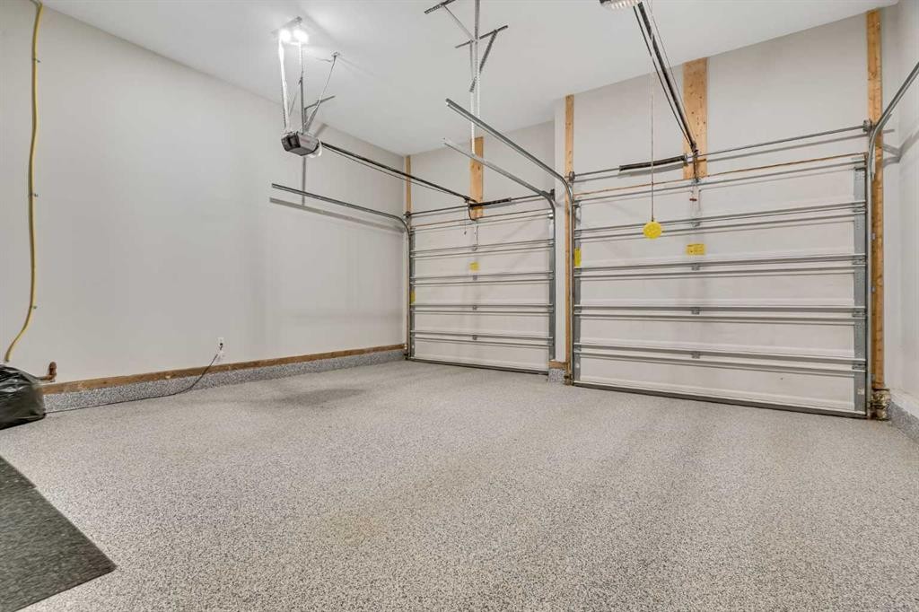 168 West Creek Landing, Chestermere, AB - Indoor Photo Showing Garage
