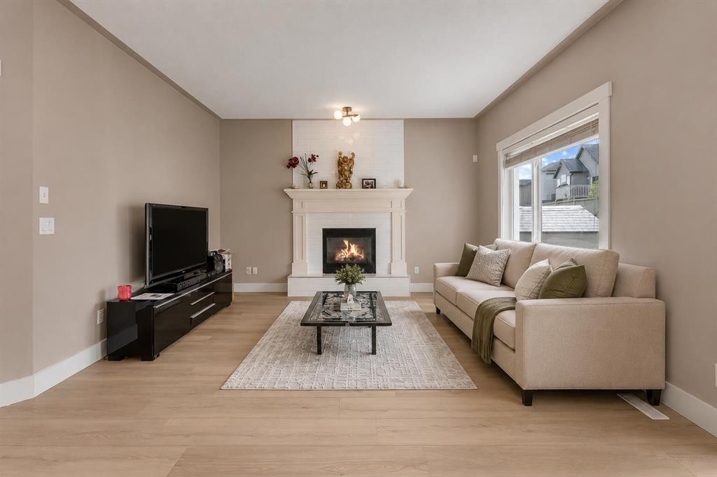 57 Sherwood Terrace Nw, Calgary, AB - Indoor Photo Showing Living Room With Fireplace