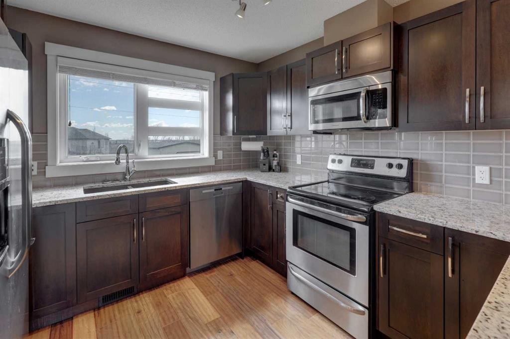 208 Covecreek Circle Ne, Calgary, AB - Indoor Photo Showing Kitchen With Stainless Steel Kitchen