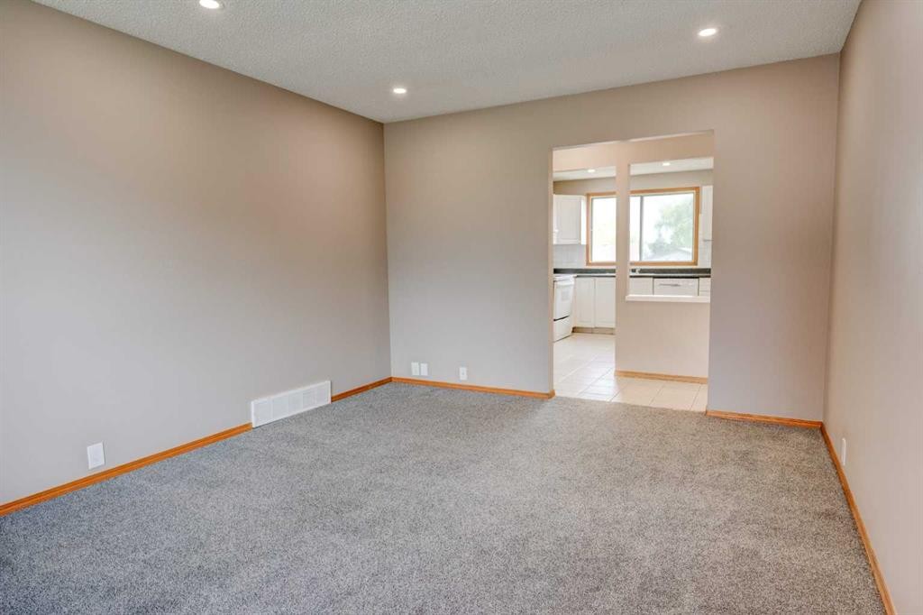 27 Dovely Way Se, Calgary, AB - Indoor Photo Showing Other Room