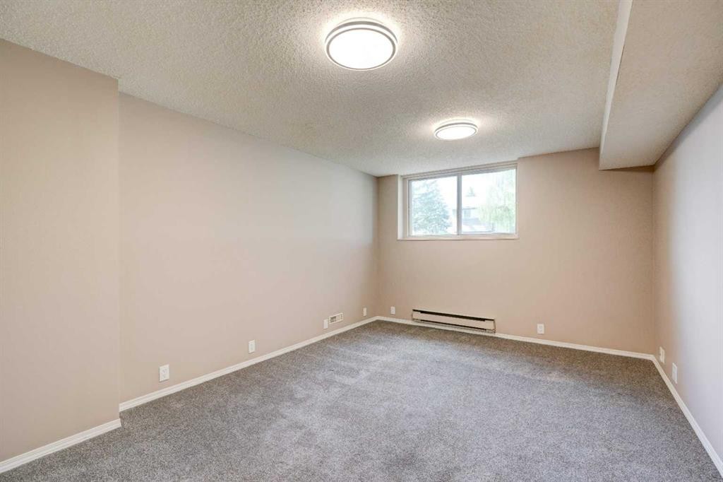 27 Dovely Way Se, Calgary, AB - Indoor Photo Showing Other Room