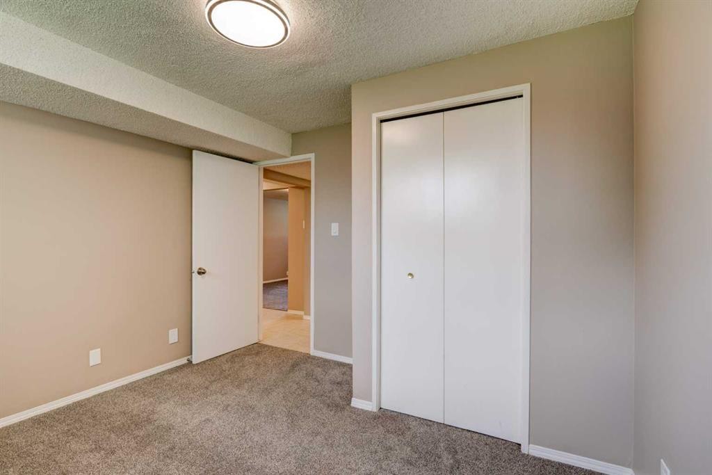 27 Dovely Way Se, Calgary, AB - Indoor Photo Showing Other Room
