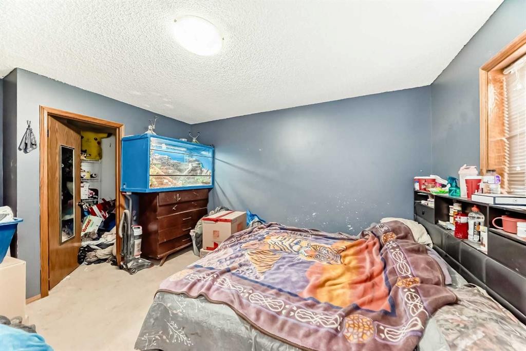 176 Woodside Road Nw, Airdrie, AB - Indoor Photo Showing Bedroom