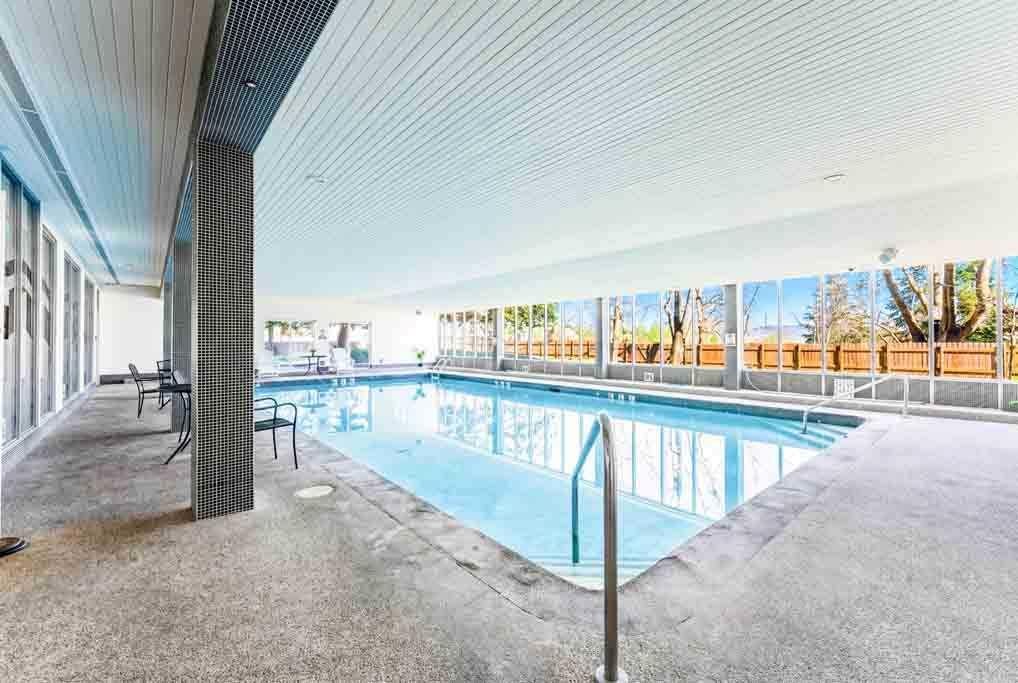 802-4944 Dalton Drive Nw, Calgary, AB - Outdoor With In Ground Pool