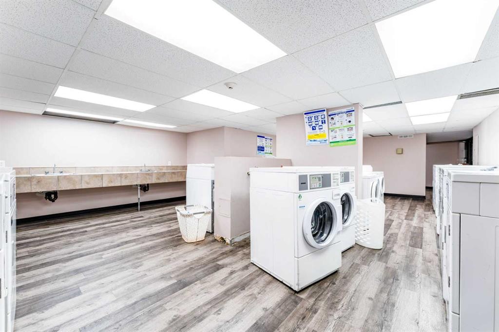 802-4944 Dalton Drive Nw, Calgary, AB - Indoor Photo Showing Laundry Room