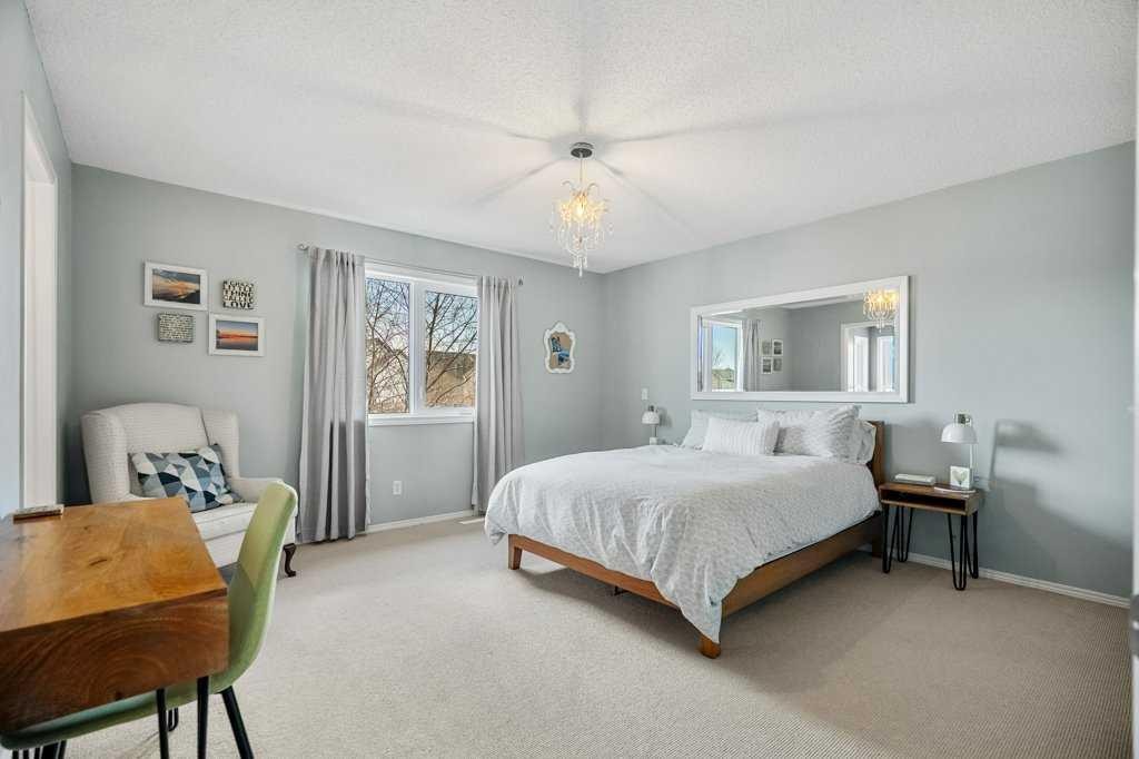 90 Elgin Drive Se, Calgary, AB - Indoor Photo Showing Bedroom