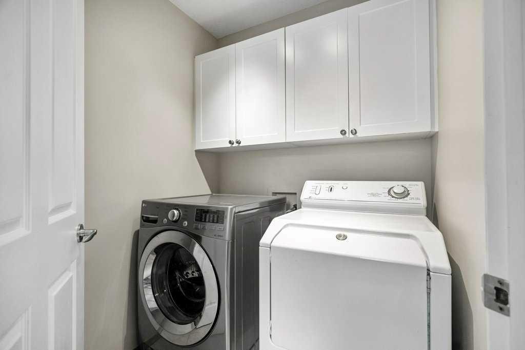 90 Elgin Drive Se, Calgary, AB - Indoor Photo Showing Laundry Room