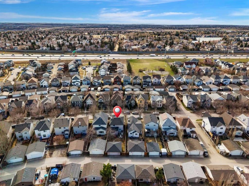90 Elgin Drive Se, Calgary, AB - Outdoor With Body Of Water With View