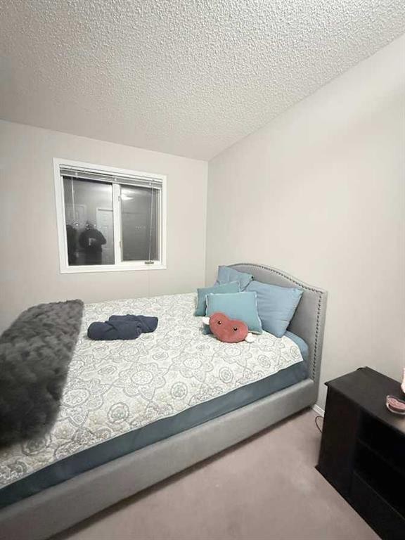 7212 Sierra Morena Boulevard Sw, Calgary, AB - Indoor Photo Showing Bedroom