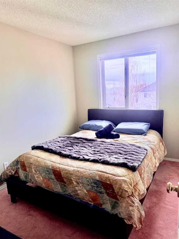 7212 Sierra Morena Boulevard Sw, Calgary, AB - Indoor Photo Showing Bedroom