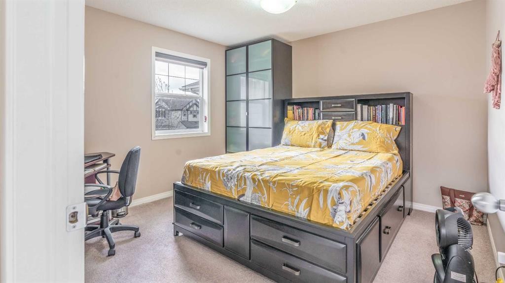 14 Silverado Ridge Link Sw, Calgary, AB - Indoor Photo Showing Bedroom