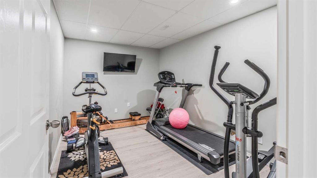 14 Silverado Ridge Link Sw, Calgary, AB - Indoor Photo Showing Gym Room