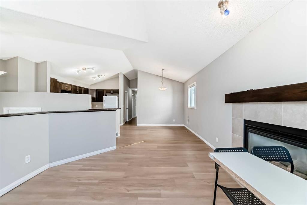 231 Saddlebrook Way Ne, Calgary, AB - Indoor With Fireplace