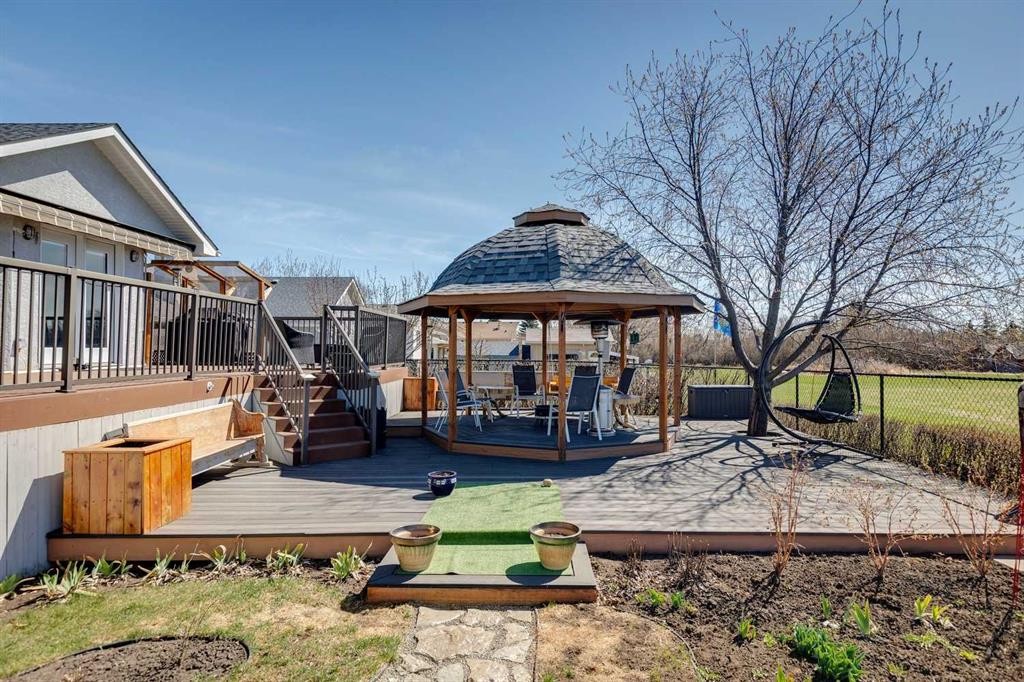 28 Westpoint Drive, Didsbury, AB - Outdoor With Deck Patio Veranda