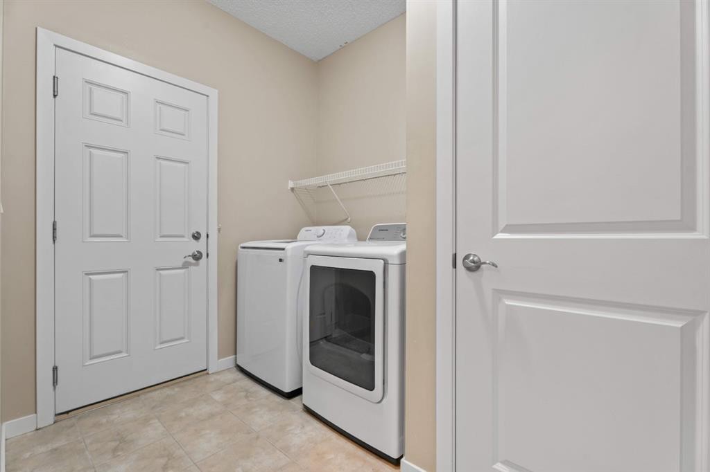 30 Redstone Parade Ne, Calgary, AB - Indoor Photo Showing Laundry Room