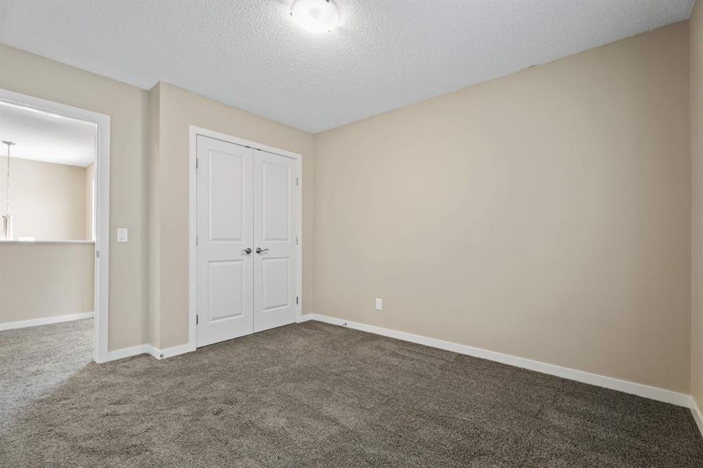 30 Redstone Parade Ne, Calgary, AB - Indoor Photo Showing Other Room