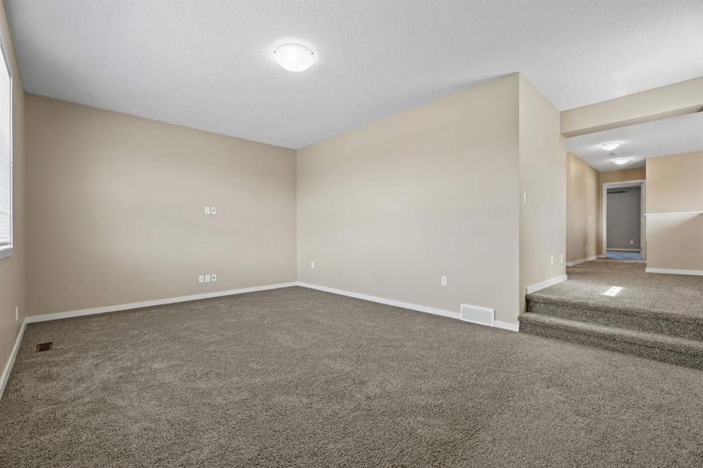 30 Redstone Parade Ne, Calgary, AB - Indoor Photo Showing Other Room