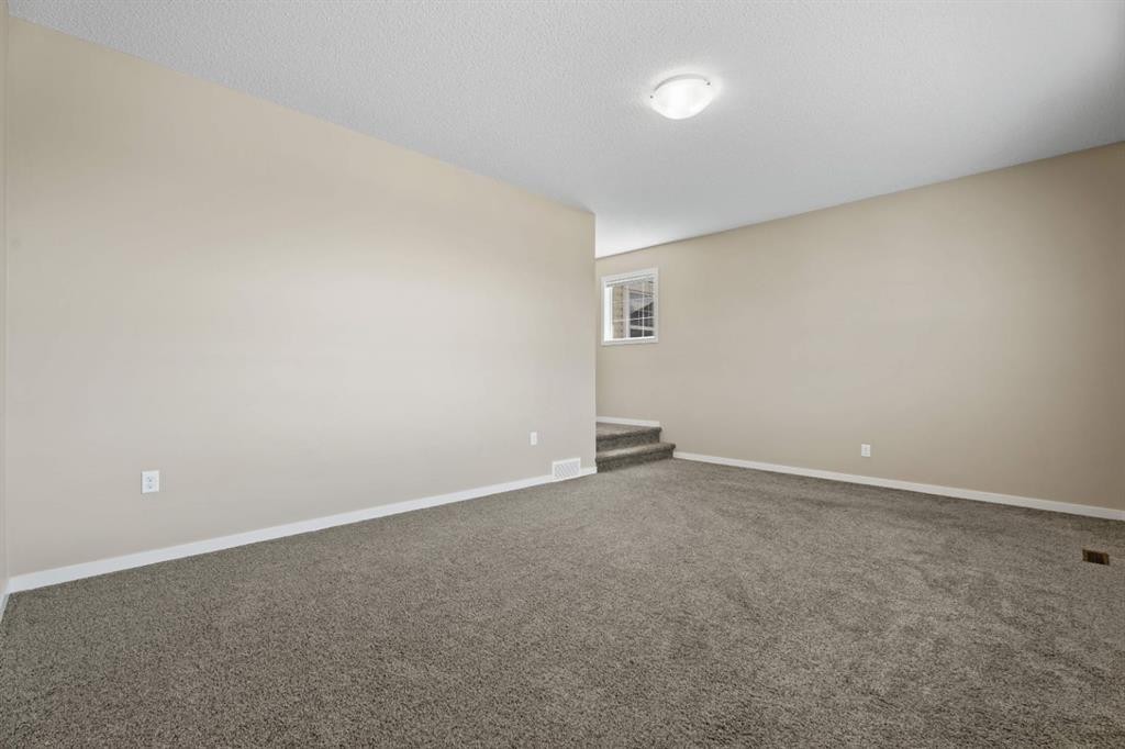 30 Redstone Parade Ne, Calgary, AB - Indoor Photo Showing Other Room