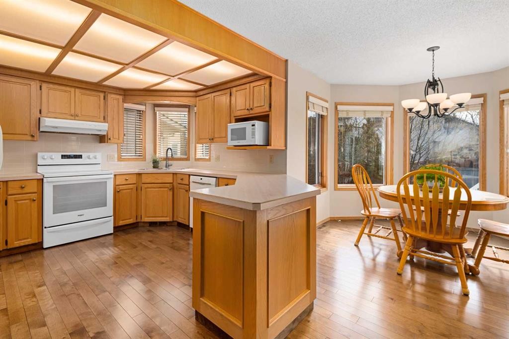 27 Hawkstone Close Nw, Calgary, AB - Indoor Photo Showing Kitchen With Double Sink