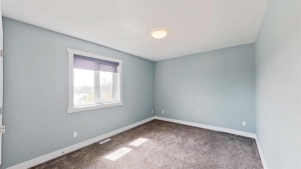 29 Sunrise Close Se, High River, AB - Indoor Photo Showing Other Room