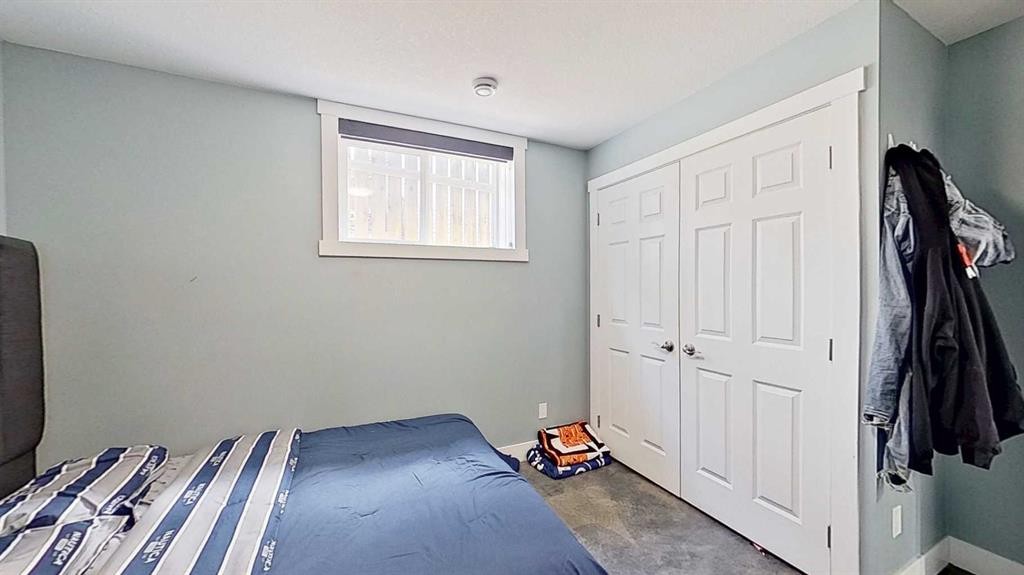 29 Sunrise Close Se, High River, AB - Indoor Photo Showing Bedroom