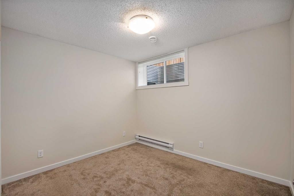 305 Cranbrook Square Se, Calgary, AB - Indoor Photo Showing Other Room