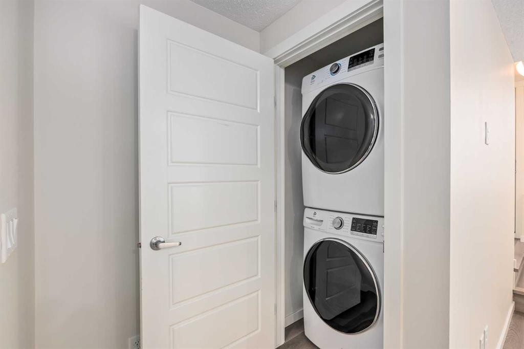 305 Cranbrook Square Se, Calgary, AB - Indoor Photo Showing Laundry Room