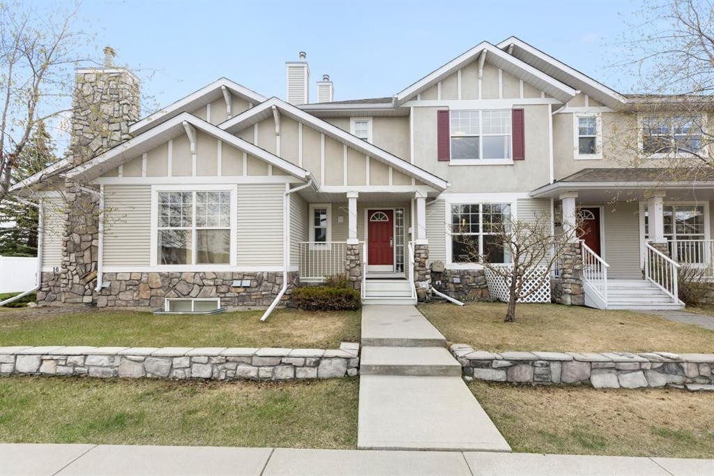 18 West Springs Gate Sw, Calgary, AB - Outdoor With Deck Patio Veranda With Facade
