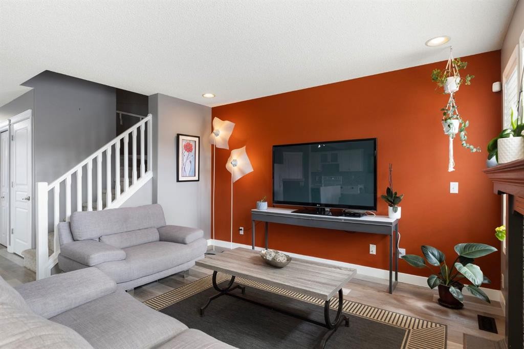 18 West Springs Gate Sw, Calgary, AB - Indoor Photo Showing Living Room