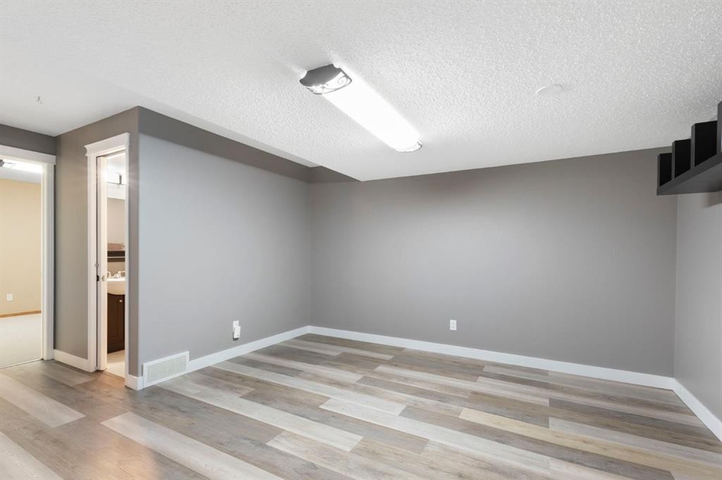 18 West Springs Gate Sw, Calgary, AB - Indoor Photo Showing Other Room