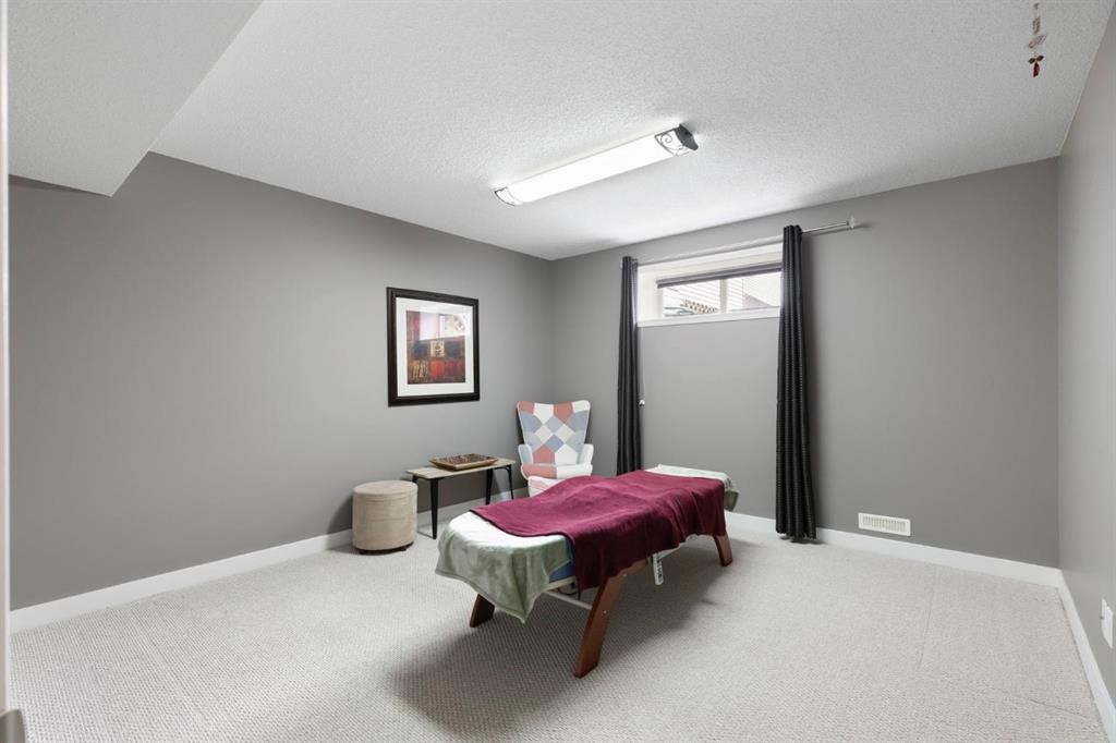 18 West Springs Gate Sw, Calgary, AB - Indoor Photo Showing Other Room