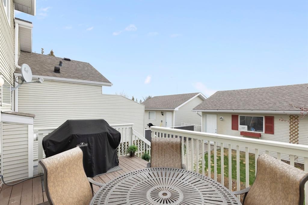 18 West Springs Gate Sw, Calgary, AB - Outdoor With Deck Patio Veranda With Exterior