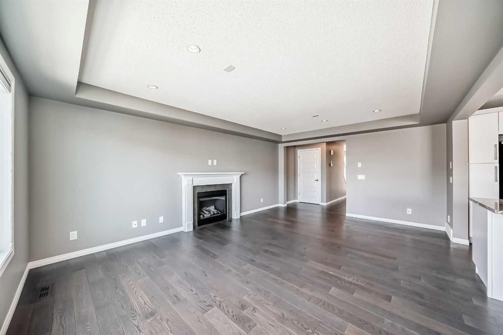 312 Viewpointe Terrace, Chestermere, AB - Indoor Photo Showing Living Room With Fireplace