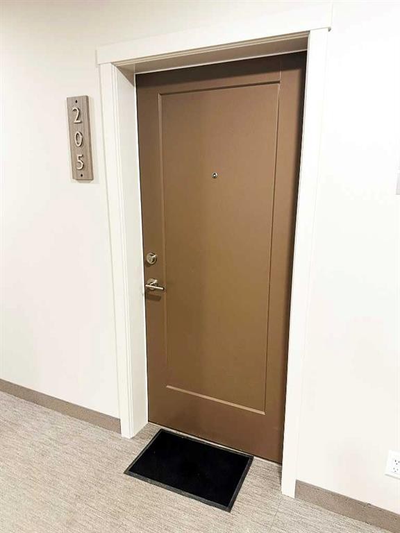 205-700 Shawnee Square Sw, Calgary, AB - Indoor Photo Showing Other Room