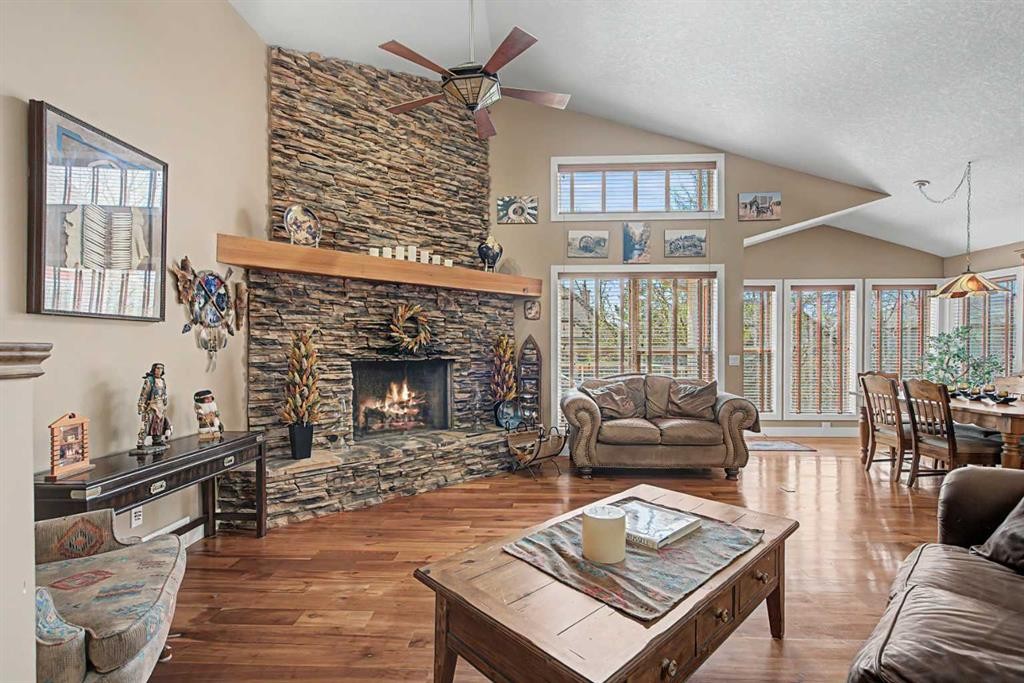 183 Discovery Ridge Way Sw, Calgary, AB - Indoor Photo Showing Living Room With Fireplace