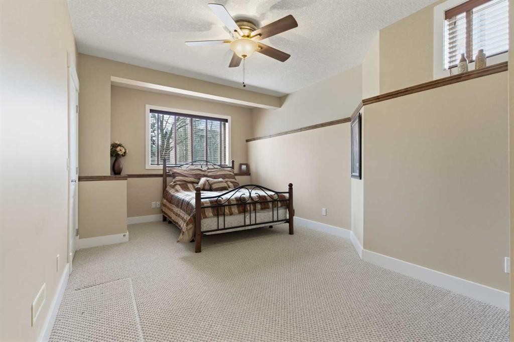 183 Discovery Ridge Way Sw, Calgary, AB - Indoor Photo Showing Bedroom