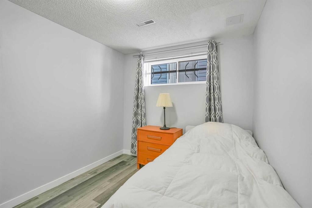 76 Aberfoyle Close Ne, Calgary, AB - Indoor Photo Showing Bedroom