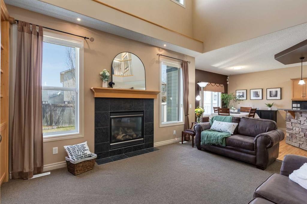 195 Willowmere Close, Chestermere, AB - Indoor Photo Showing Living Room With Fireplace