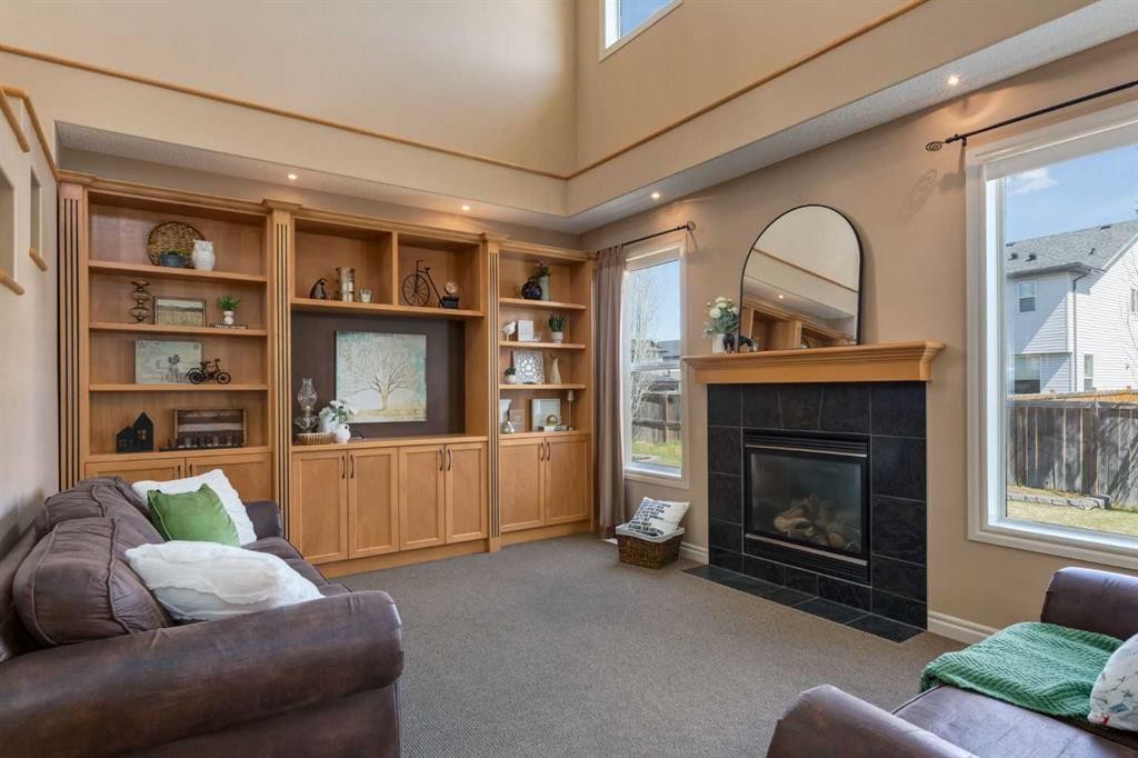 195 Willowmere Close, Chestermere, AB - Indoor Photo Showing Living Room With Fireplace