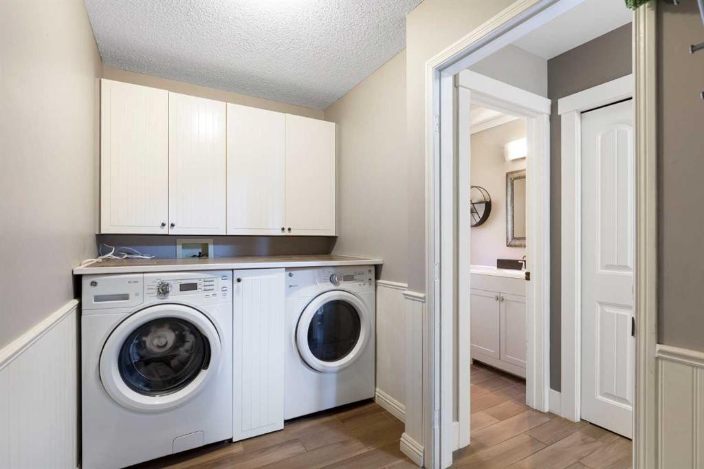 1030 Mckenzie Lake Bay Se, Calgary, AB - Indoor Photo Showing Laundry Room