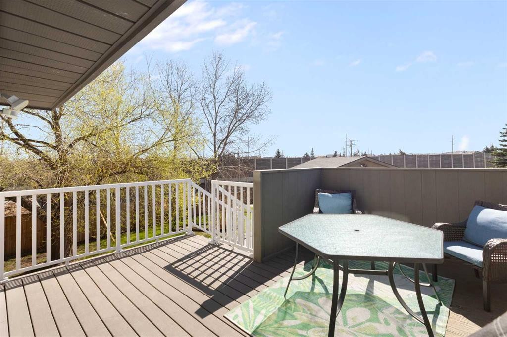 1030 Mckenzie Lake Bay Se, Calgary, AB - Outdoor With Deck Patio Veranda With Exterior