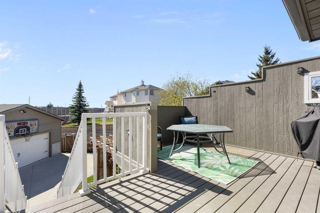 1030 Mckenzie Lake Bay Se, Calgary, AB - Outdoor With Deck Patio Veranda With Exterior
