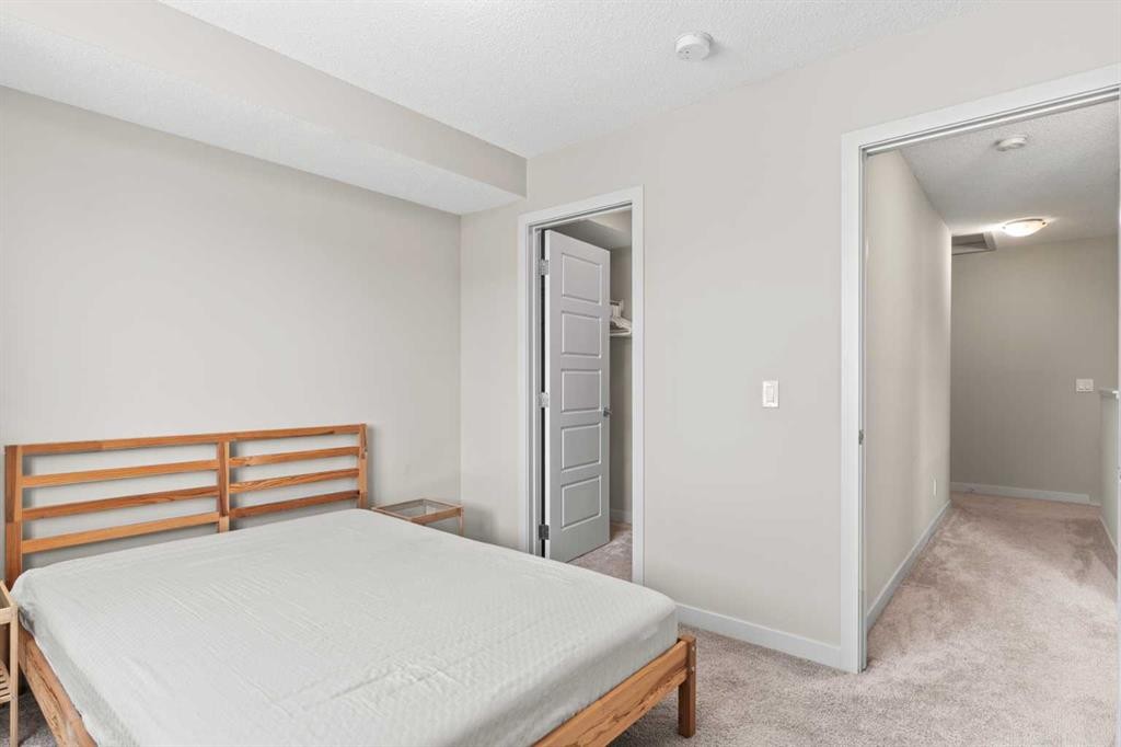 310-32 Red Embers Parade Ne, Calgary, AB - Indoor Photo Showing Bedroom