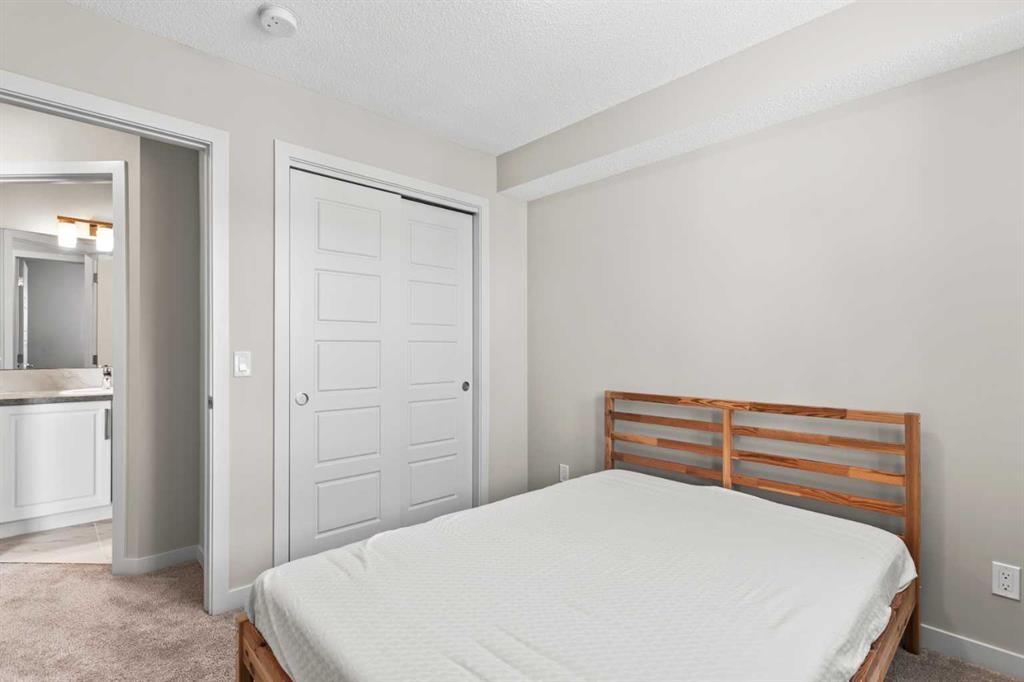 310-32 Red Embers Parade Ne, Calgary, AB - Indoor Photo Showing Bedroom